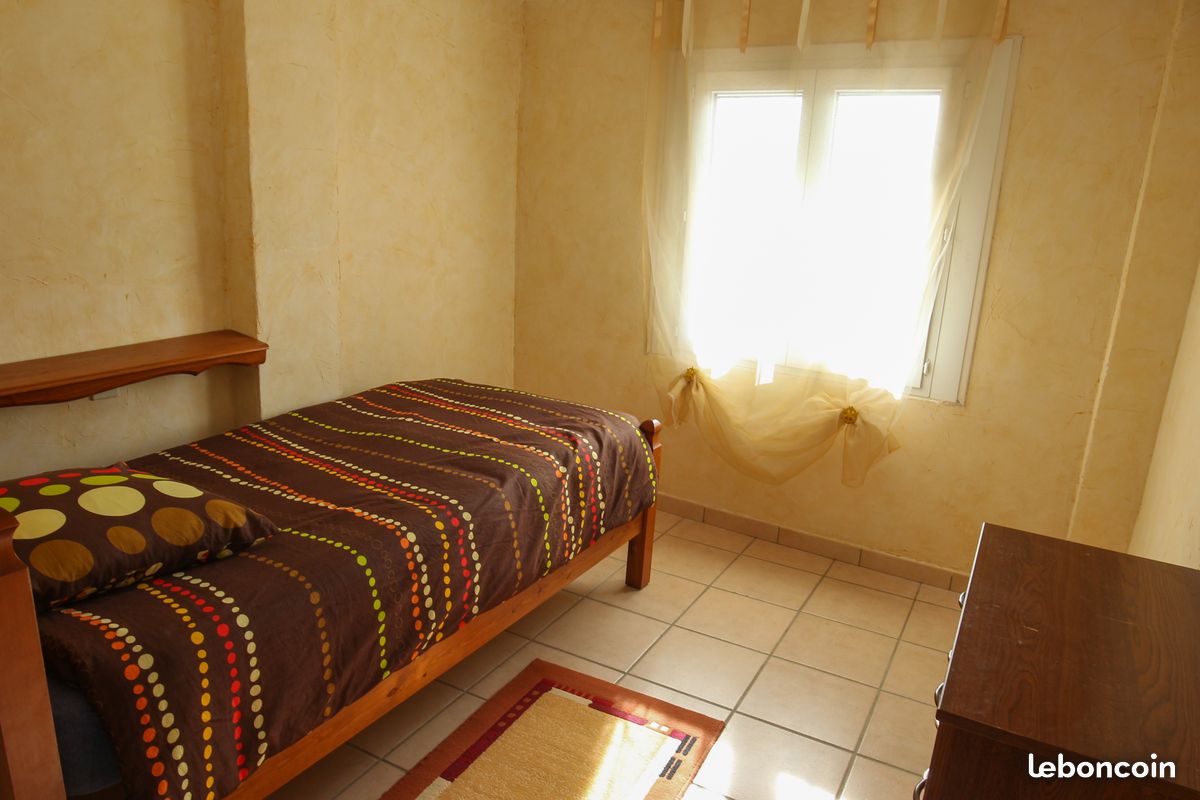 chambre simple - Appartement L'Oliveraie F3 - 5 personnes